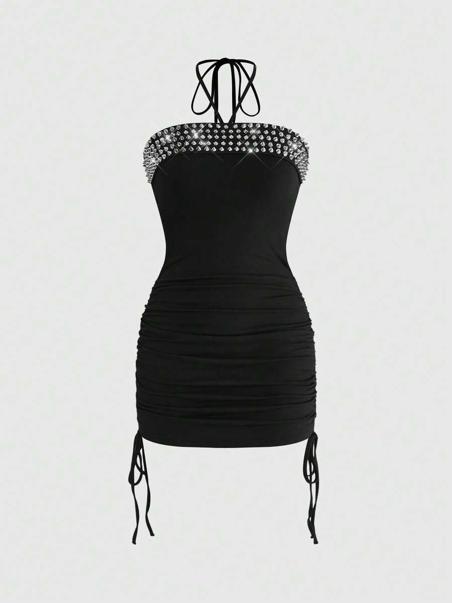 Women's black halter bodycon mini dress featuring ruched details, a sleeveless cut, and slim fit silhouette made from knitted fabric.