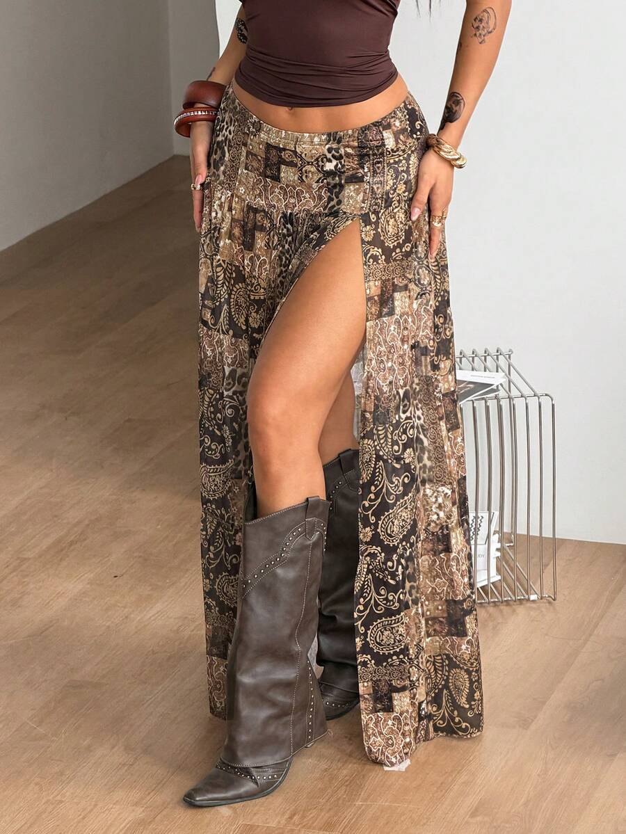 Women's blue and brown graphic print long flared skirt with low waist, split thigh detail, and textured semi-sheer fabric.