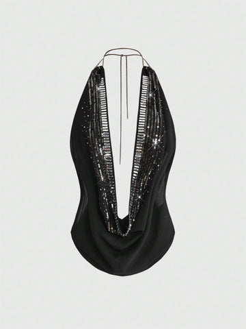 Women wearing a black Y2K draped halter neck backless sequin crop top crafted from semi-sheer chiffon fabric.