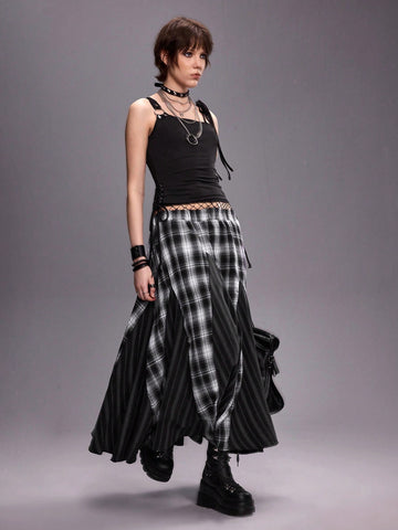 Women's black asymmetrical shoulder tie cami top with metallic ring detail and slim fit design.