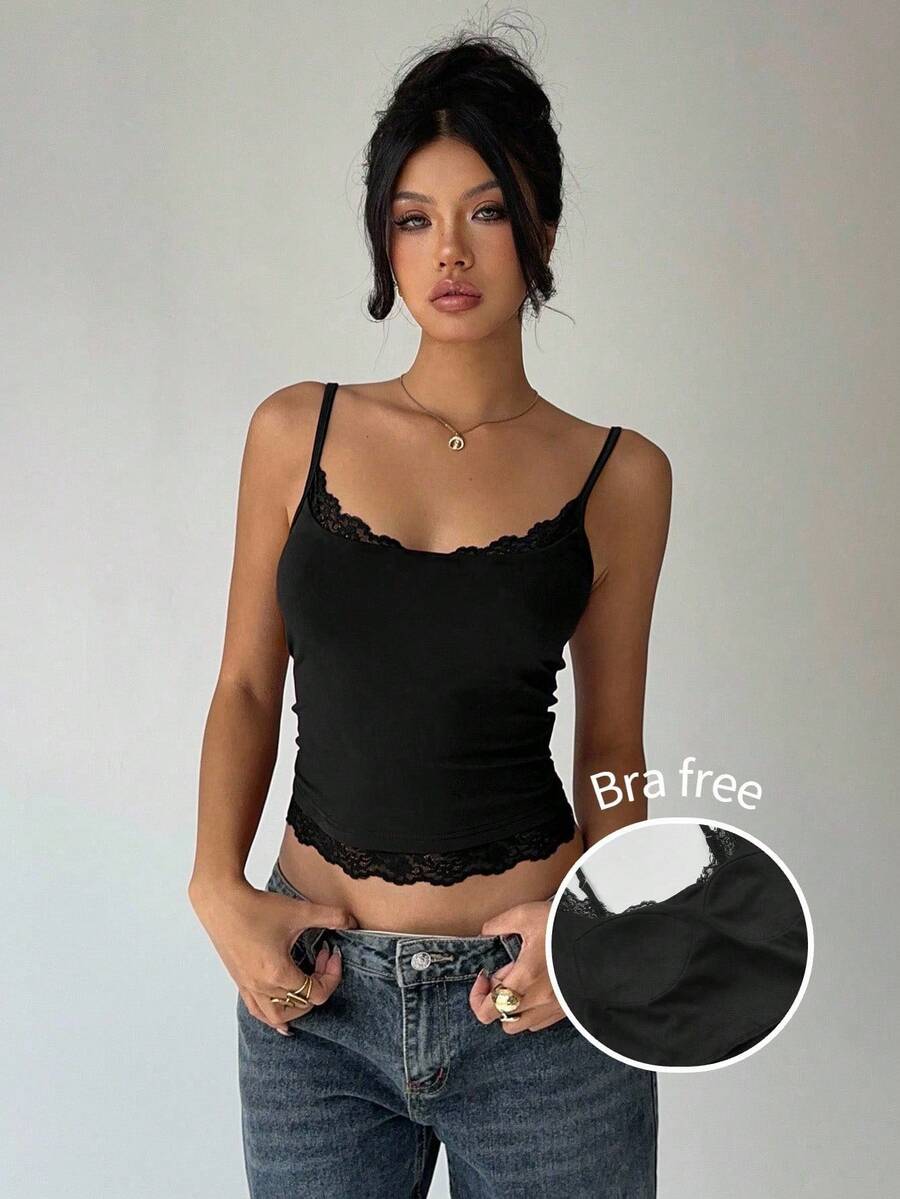 Women's black rib-knit camisole top featuring contrast lace patchwork around the neckline and slim spaghetti straps.