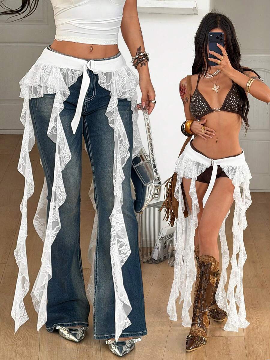White semi-sheer lace fringe ruffle long skirt featuring a low waist, asymmetrical hem, and textured pattern for women's festival outfits.
