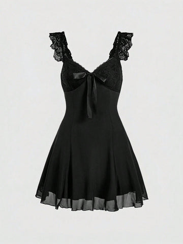 Gothic style lace patchwork sleeveless mini dress for women featuring a sweetheart neckline, high waist flared hem, contrast lace, bow, and knot details.
