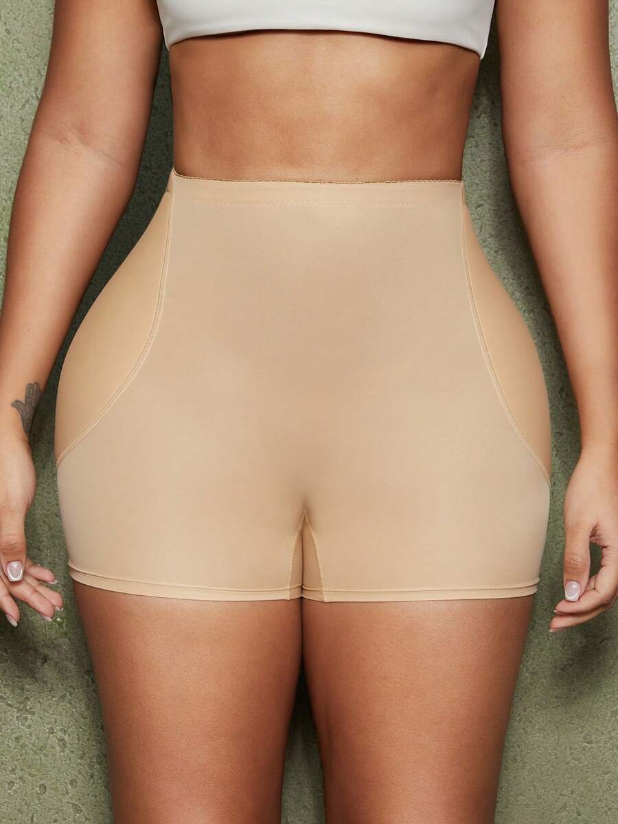 Women's waist cincher shapewear bottom featuring tummy control and padded hips.