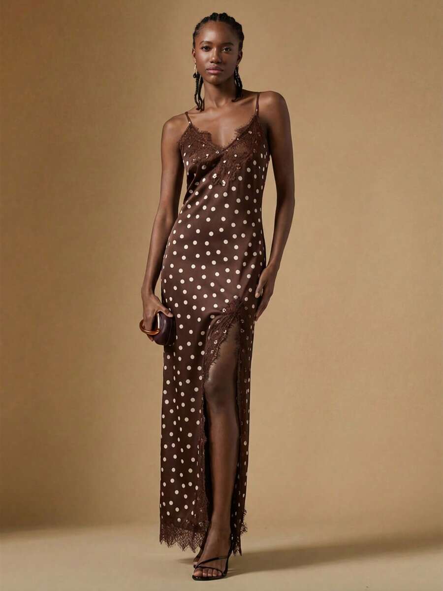 Women's black lace split satin long dress featuring spaghetti straps, asymmetrical slit hem, and matching arm sleeves.