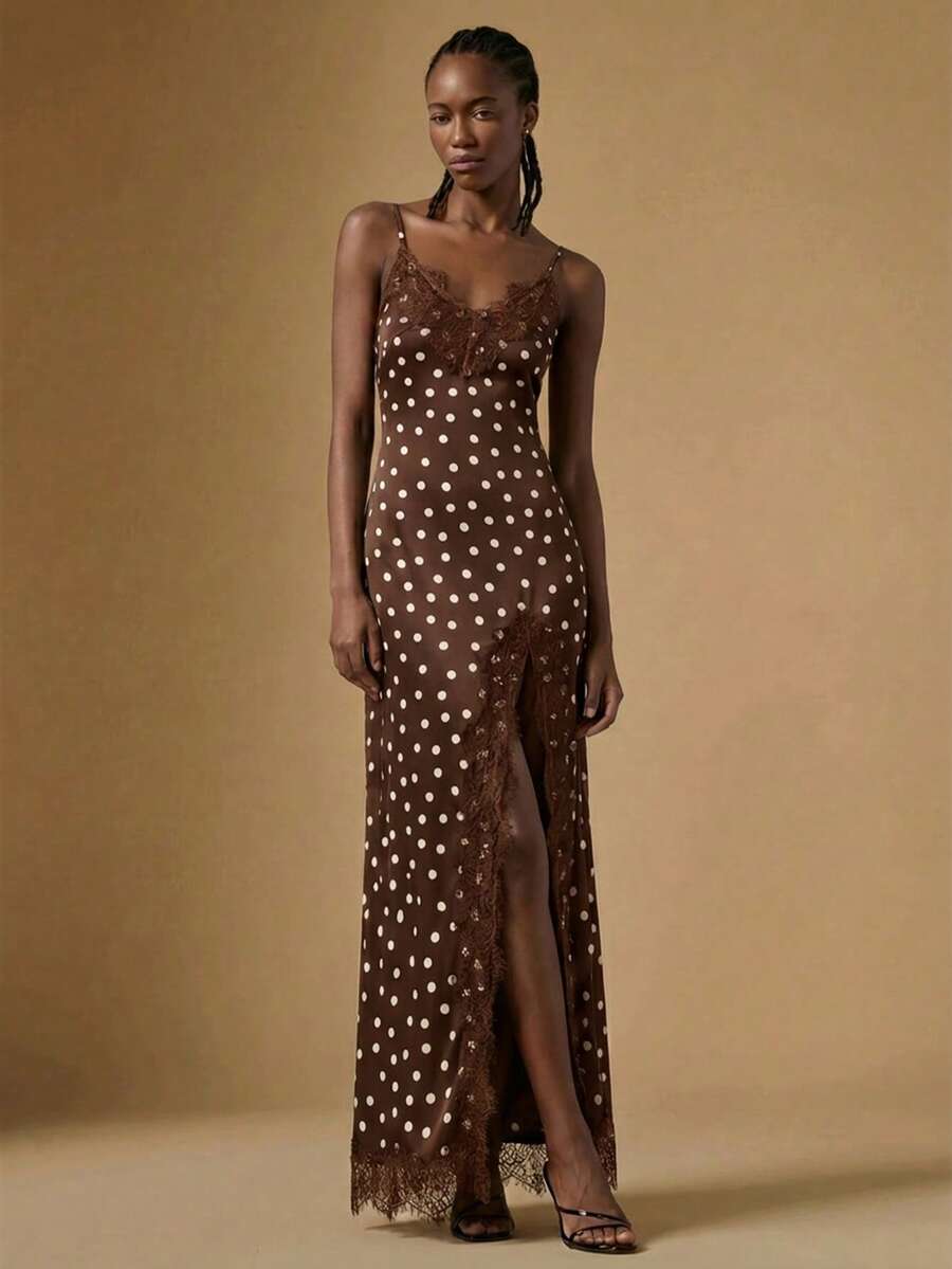 Women's black lace split satin long dress featuring spaghetti straps, asymmetrical slit hem, and matching arm sleeves.