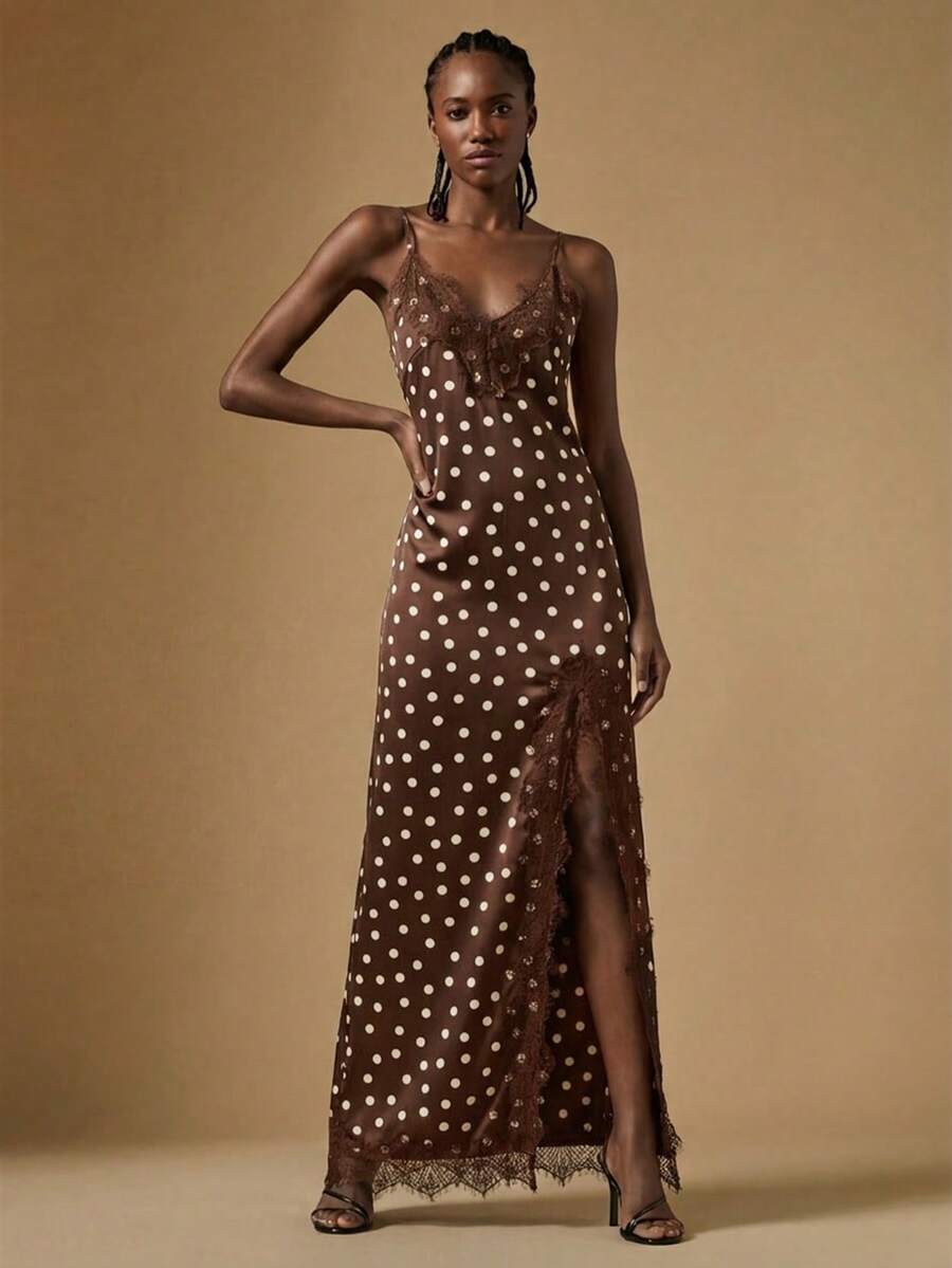 Women's black lace split satin long dress featuring spaghetti straps, asymmetrical slit hem, and matching arm sleeves.