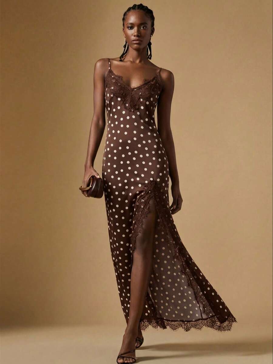 Women's black lace split satin long dress featuring spaghetti straps, asymmetrical slit hem, and matching arm sleeves.