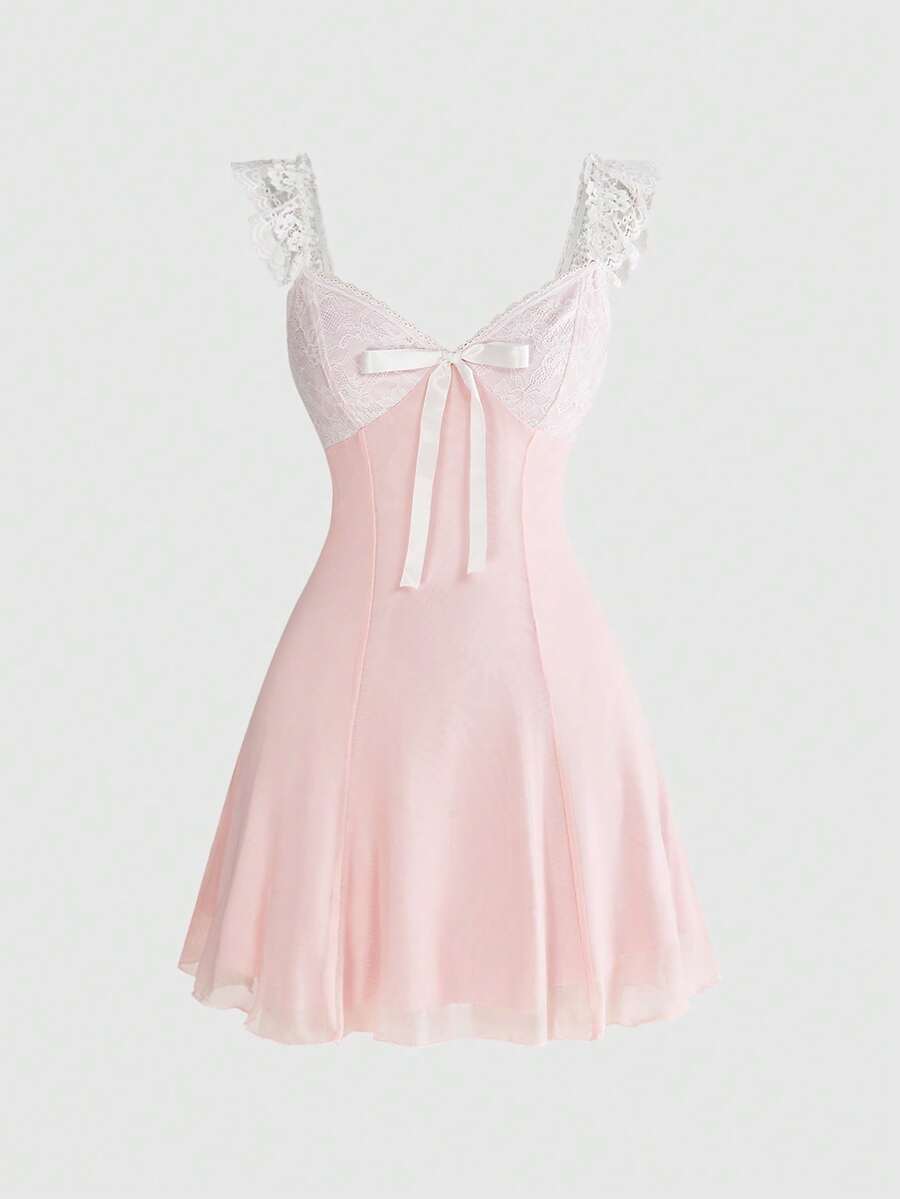 Gothic style lace patchwork sleeveless mini dress for women featuring a sweetheart neckline, high waist flared hem, contrast lace, bow, and knot details.