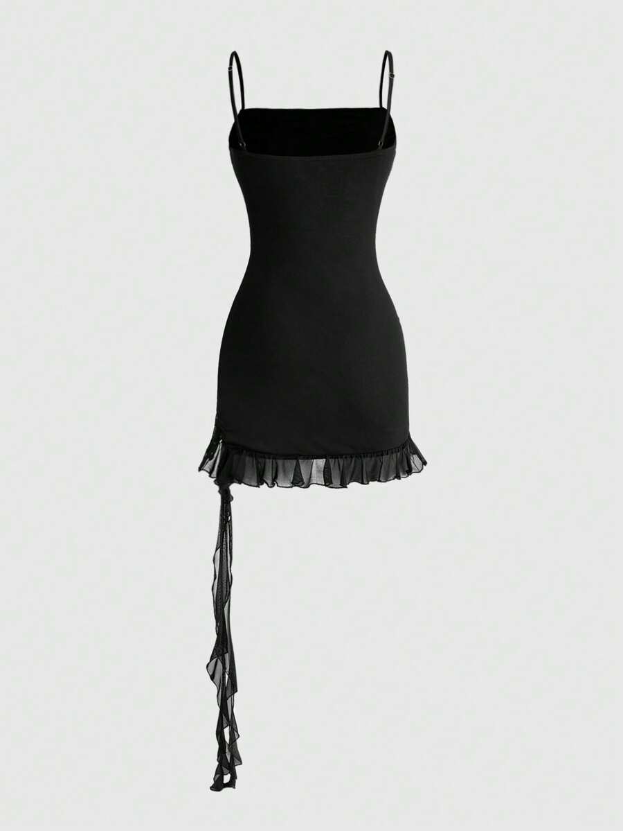 Black semi-sheer goth bodycon mini dress featuring spaghetti straps, studded details, flounce hem, and mesh fabric.