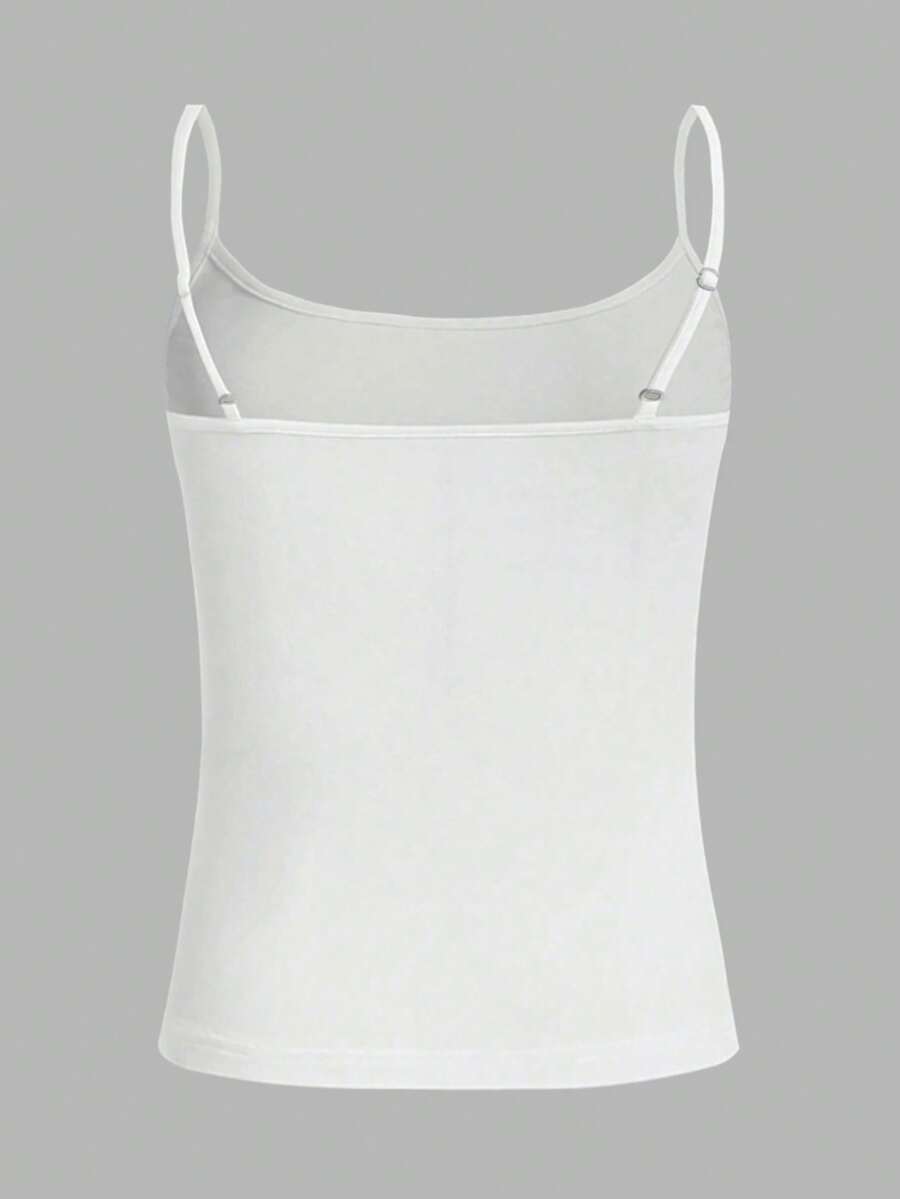 Burgundy cross pattern camisole top featuring spaghetti straps, ring accent, and a backless slim fit design.