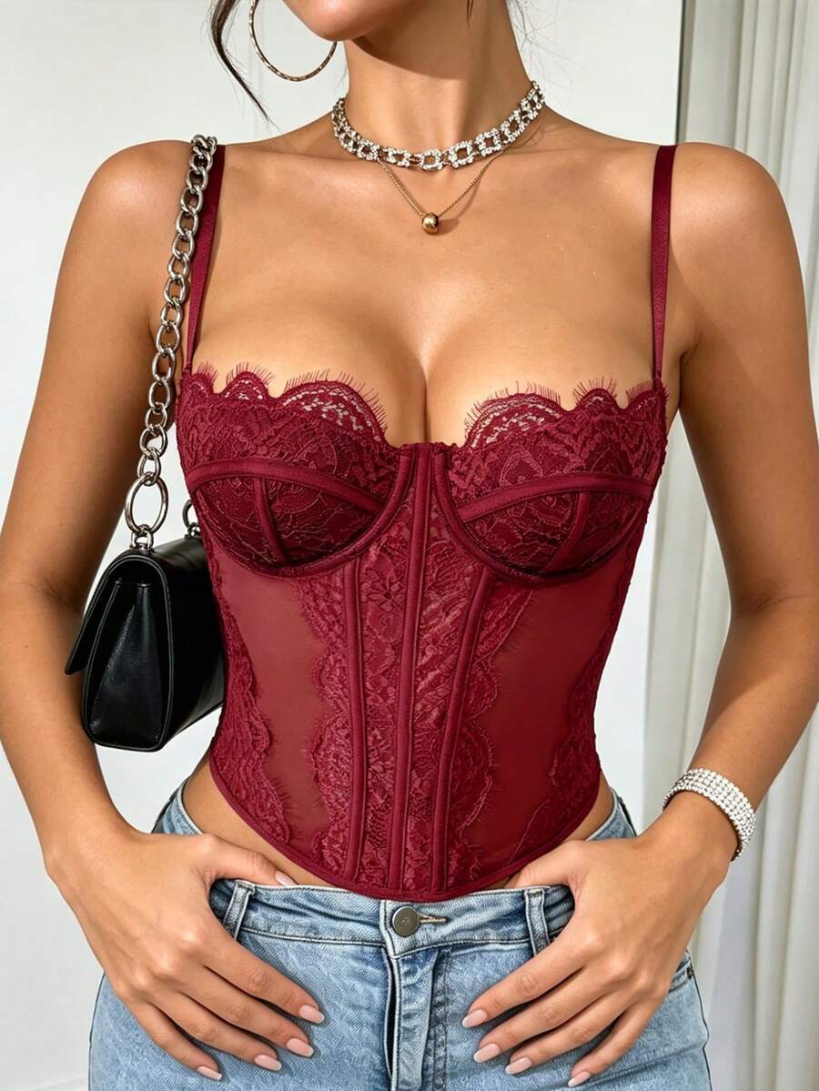Women's black lace crop camisole featuring a deep V-neckline, slim fit silhouette, and matching arm sleeves.