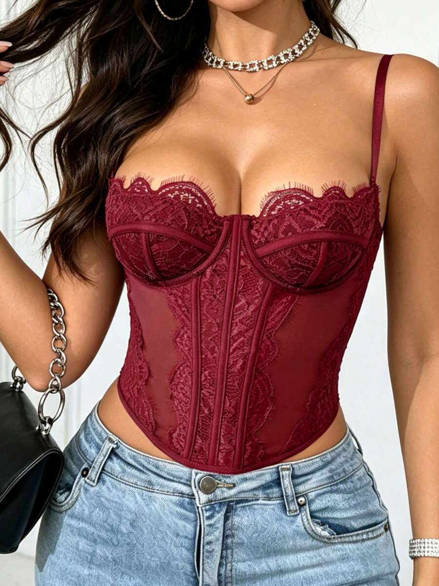 Women's black lace crop camisole featuring a deep V-neckline, slim fit silhouette, and matching arm sleeves.