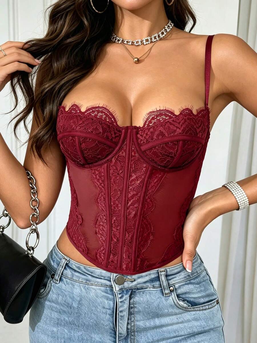 Women's black lace crop camisole featuring a deep V-neckline, slim fit silhouette, and matching arm sleeves.