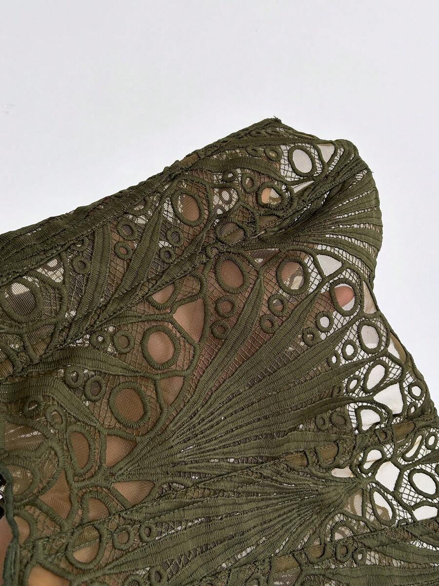 Women’s strapless corset bustier top with lace-up detail, asymmetrical embroidery, semi-sheer finish, and slim fit.