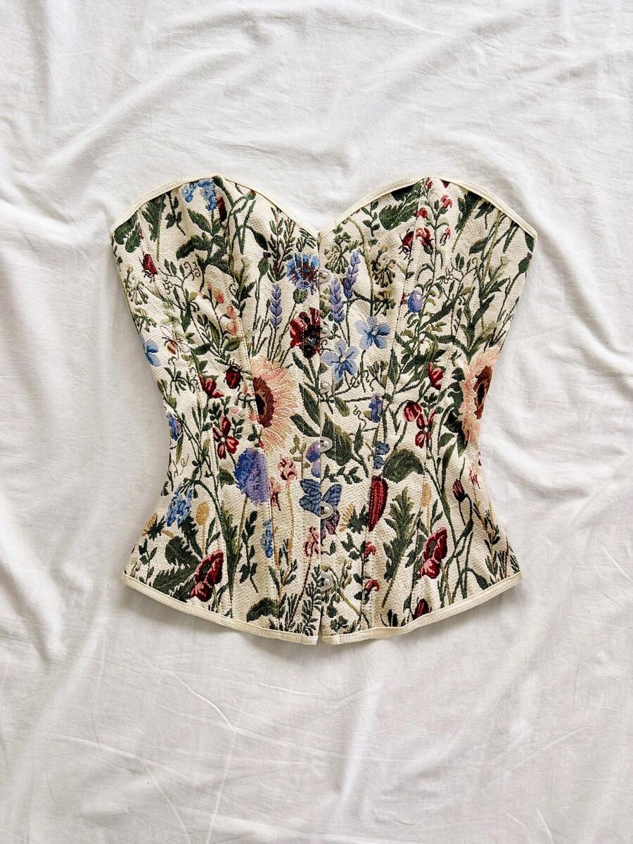 Women's apricot retro floral print bandeau crop top featuring a strapless asymmetrical neckline, lace-up back tie detail, and ruched slim fit woven fabric.