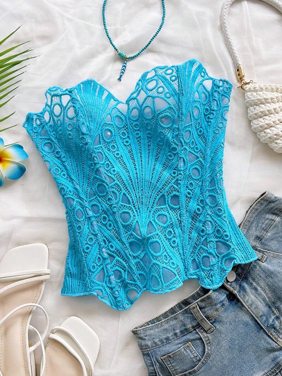 Women’s strapless corset bustier top with lace-up detail, asymmetrical embroidery, semi-sheer finish, and slim fit.