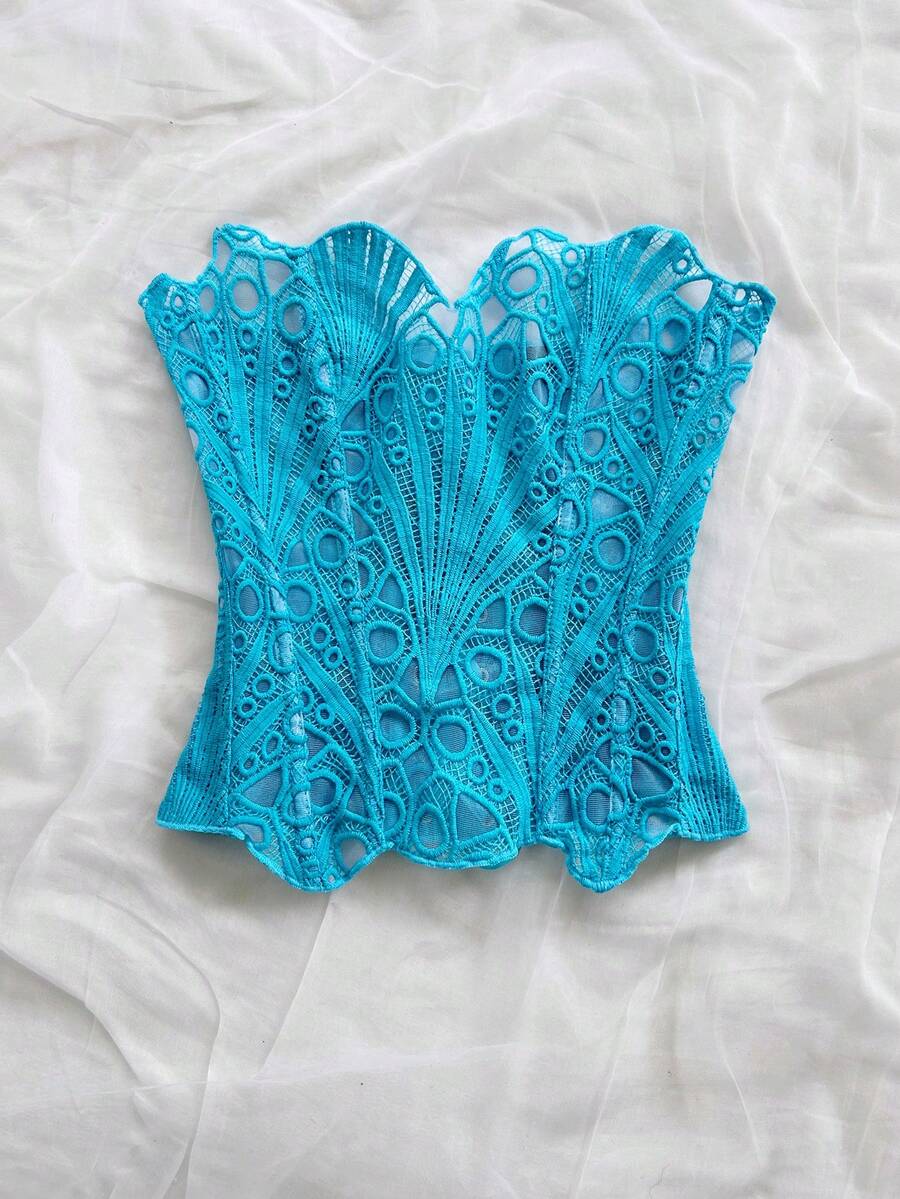 Women’s strapless corset bustier top with lace-up detail, asymmetrical embroidery, semi-sheer finish, and slim fit.
