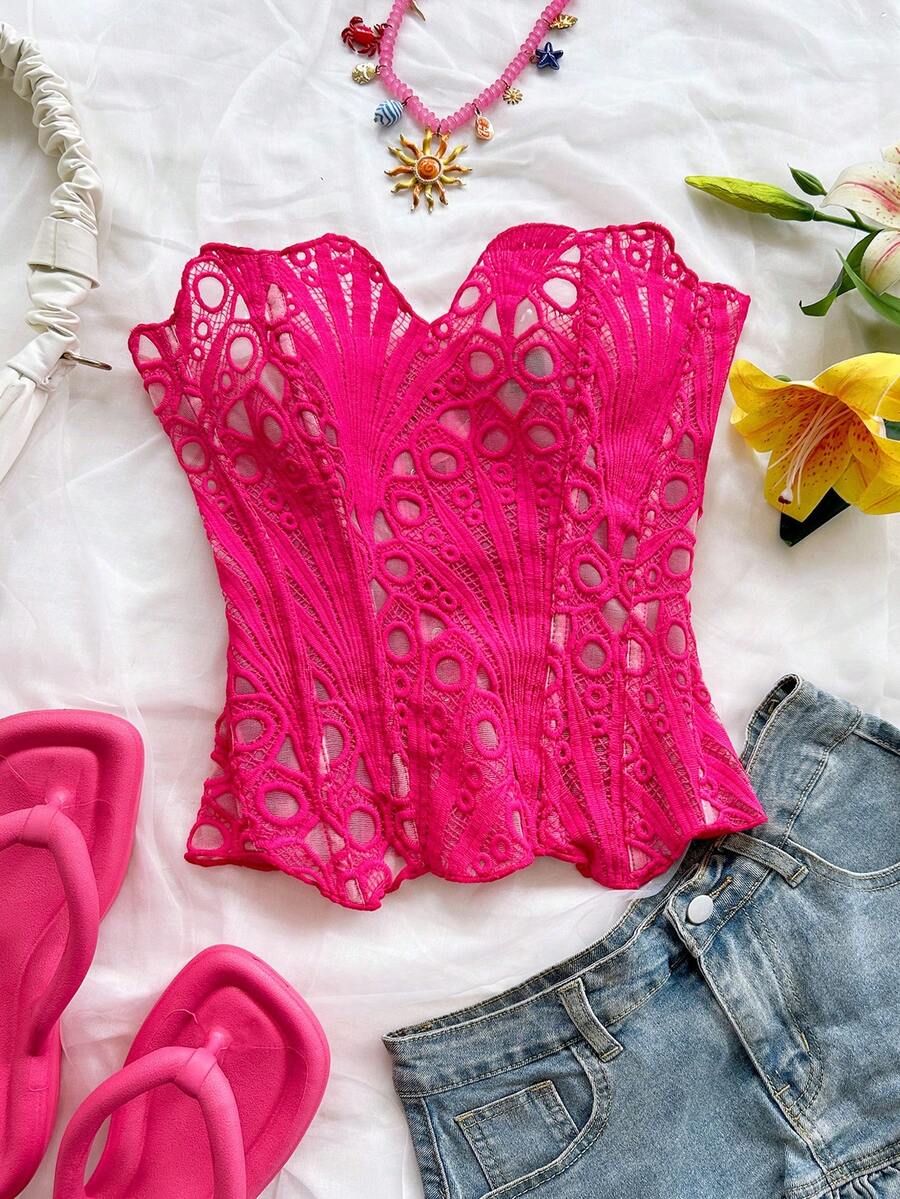 Women’s strapless corset bustier top with lace-up detail, asymmetrical embroidery, semi-sheer finish, and slim fit.