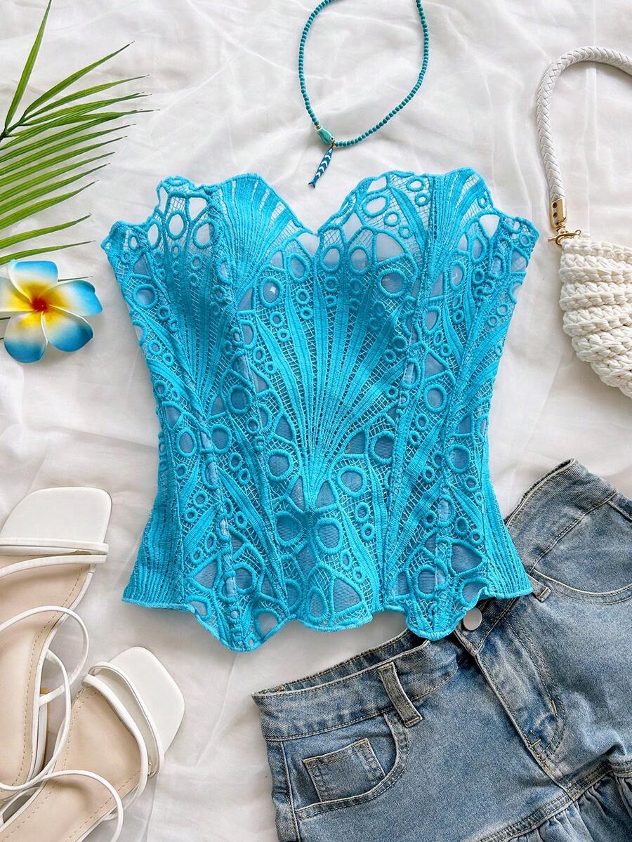 Women’s strapless corset bustier top with lace-up detail, asymmetrical embroidery, semi-sheer finish, and slim fit.