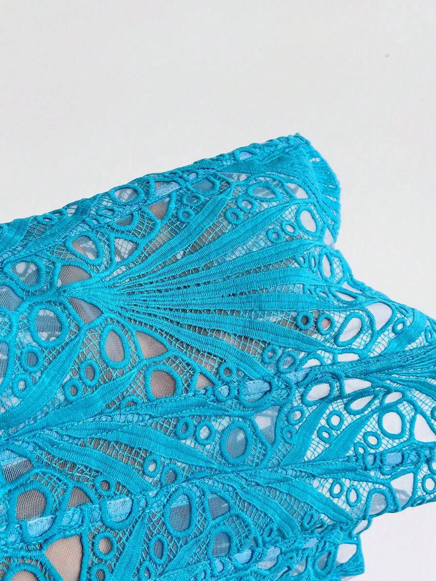 Women’s strapless corset bustier top with lace-up detail, asymmetrical embroidery, semi-sheer finish, and slim fit.