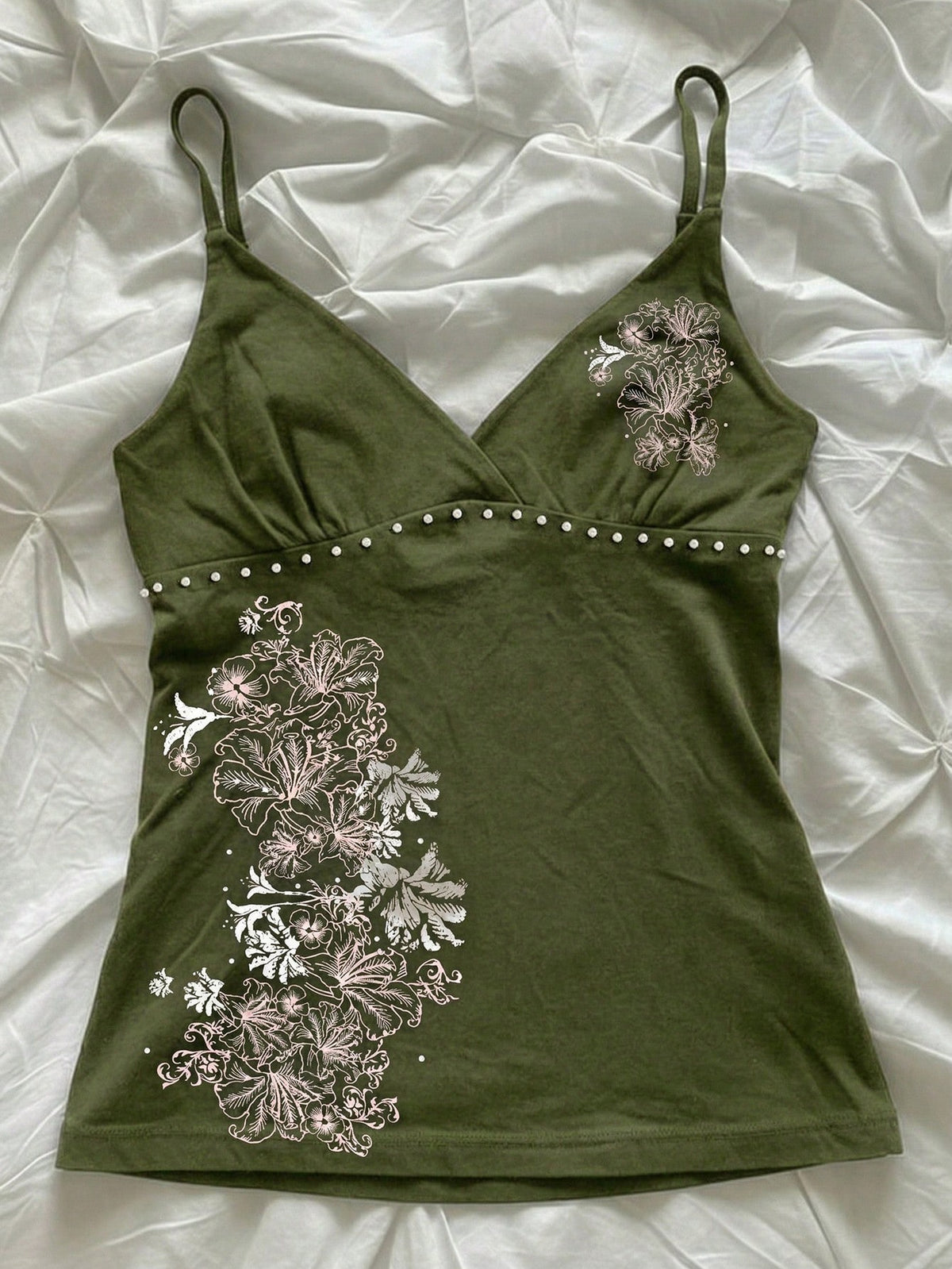 Women's slim fit spaghetti strap cami top featuring a tropical hibiscus floral graphic print.