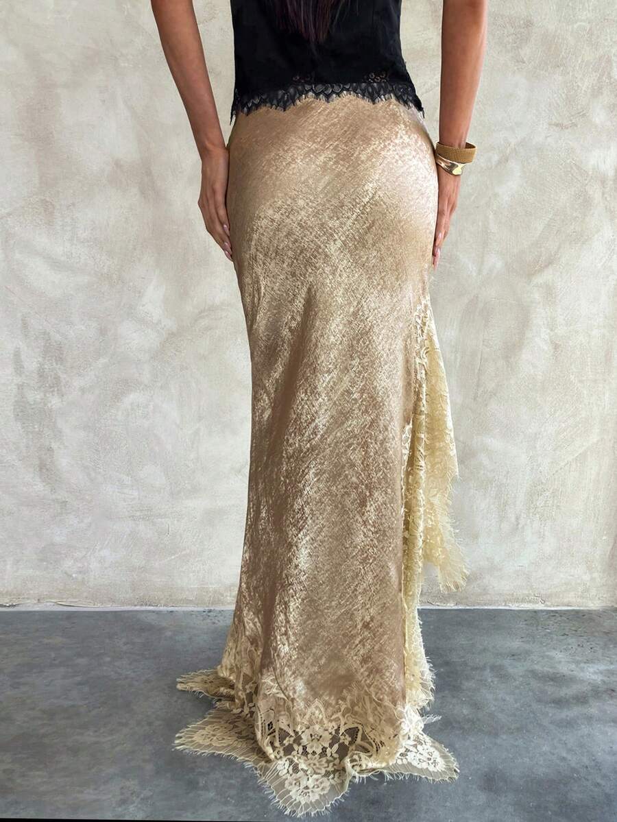 Women's elegant black lace patchwork mermaid maxi skirt featuring asymmetrical contrast lace design and low waist fit.