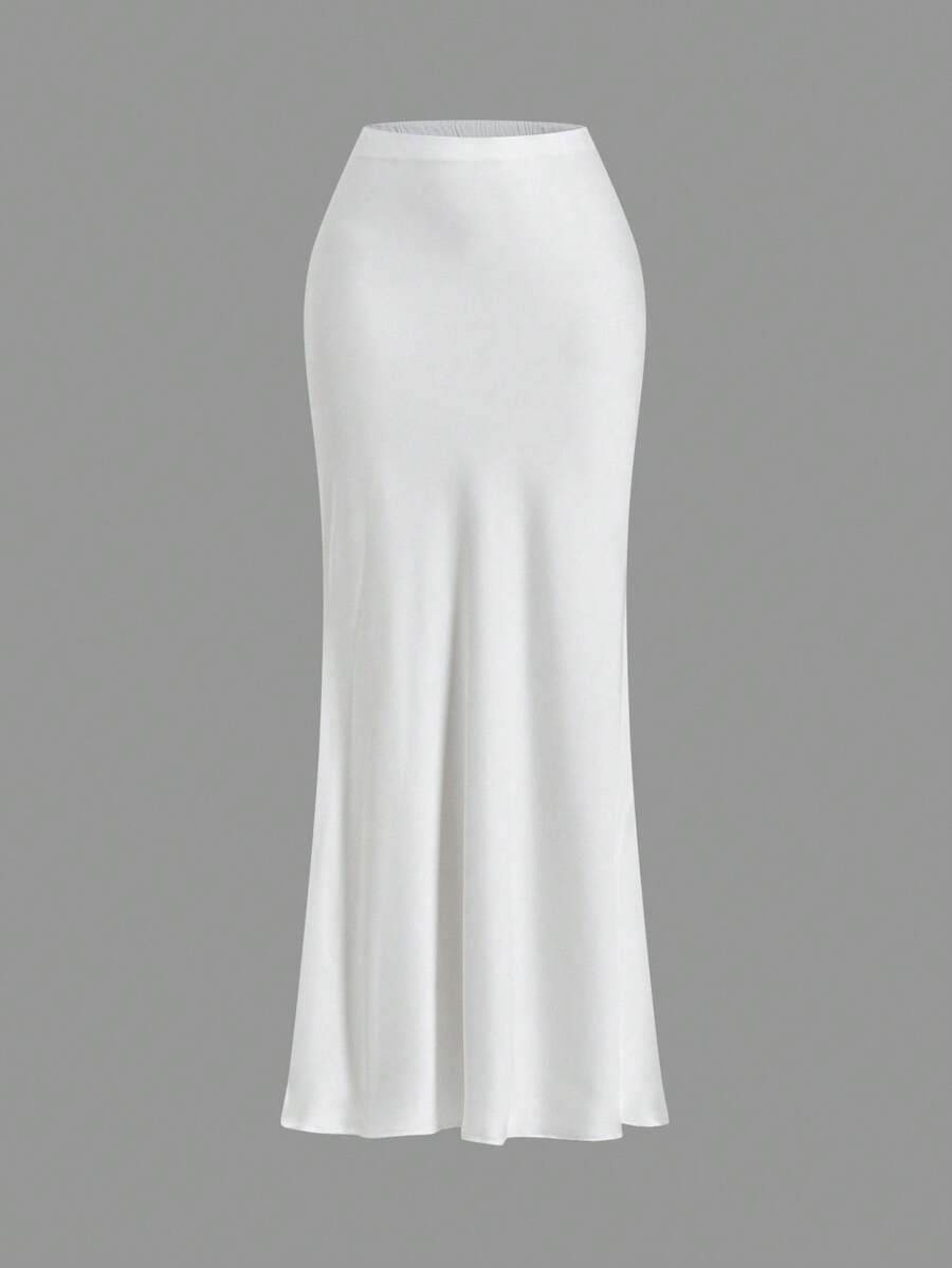 Women's black woven mermaid maxi skirt featuring a solid color design, mid waist, and 100% cotton fabric.