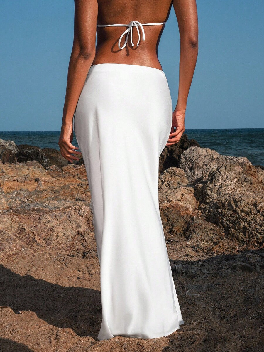 Women's black woven mermaid maxi skirt featuring a solid color design, mid waist, and 100% cotton fabric.