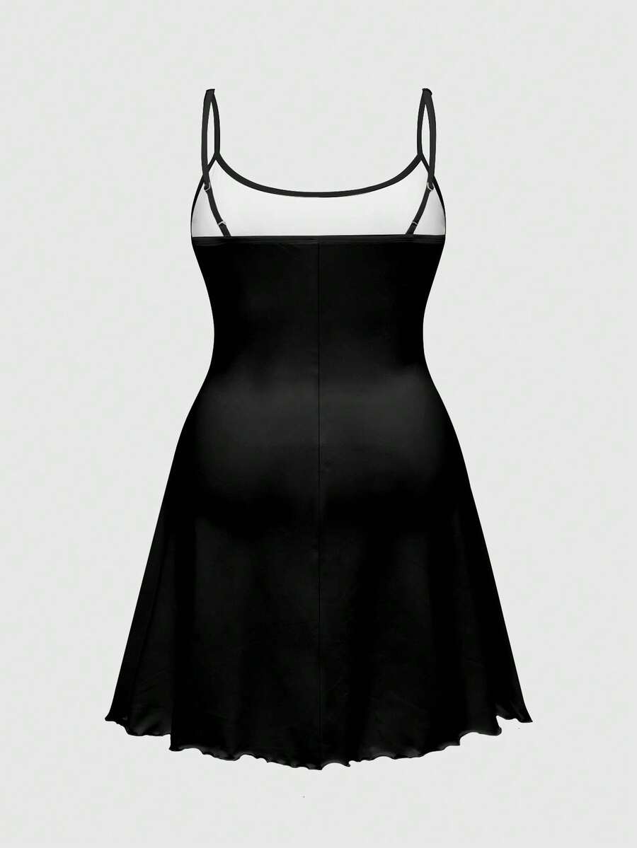 Women's black backless cami mini dress featuring spaghetti straps, lettuce trim detail, high waist, and a flared hem design.