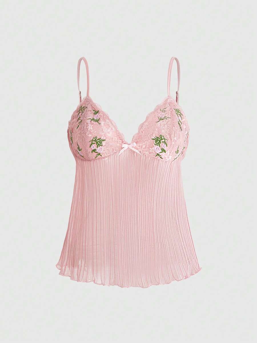 Pink lace embroidered spaghetti strap camisole top for women featuring backless design and slim fit silhouette.