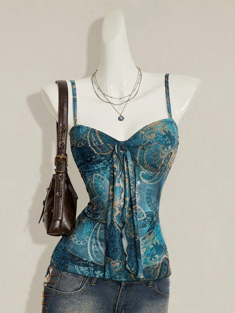 Burgundy paisley print ruched cami top for women featuring thin spaghetti straps, asymmetrical lace-up detail, and a slim fit.
