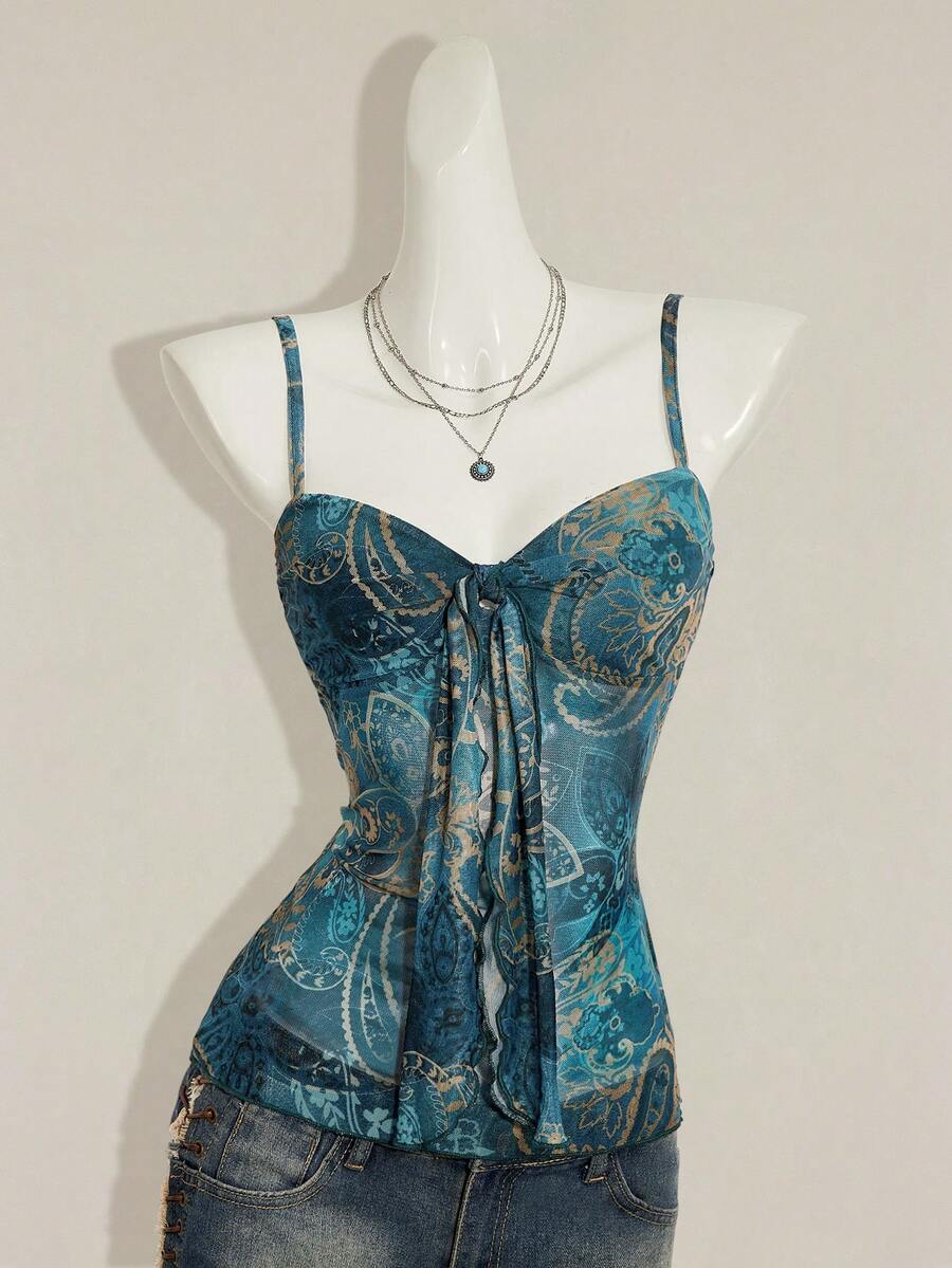 Burgundy paisley print ruched cami top for women featuring thin spaghetti straps, asymmetrical lace-up detail, and a slim fit.