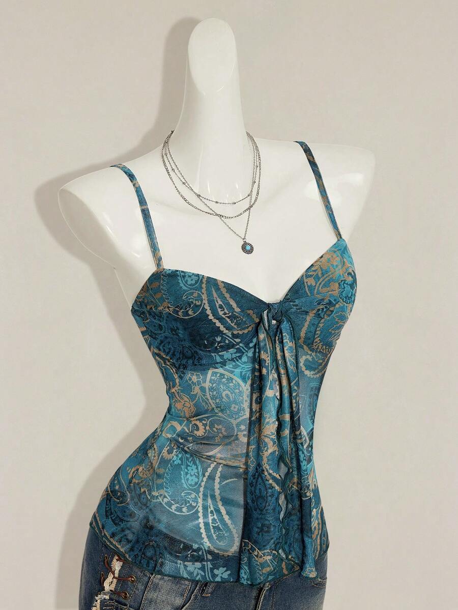 Burgundy paisley print ruched cami top for women featuring thin spaghetti straps, asymmetrical lace-up detail, and a slim fit.
