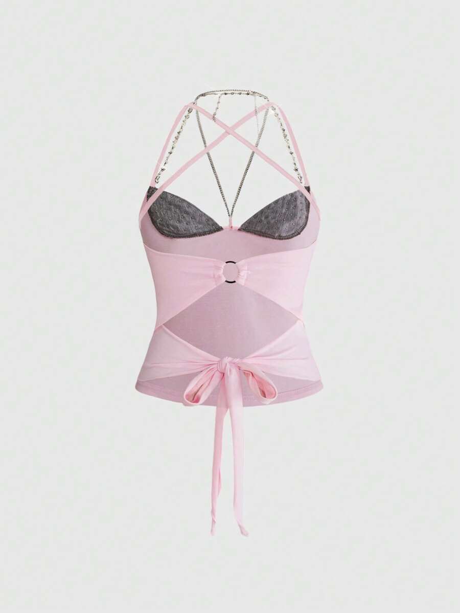 Women's black halter backless crop top with criss cross knot design and spaghetti straps.