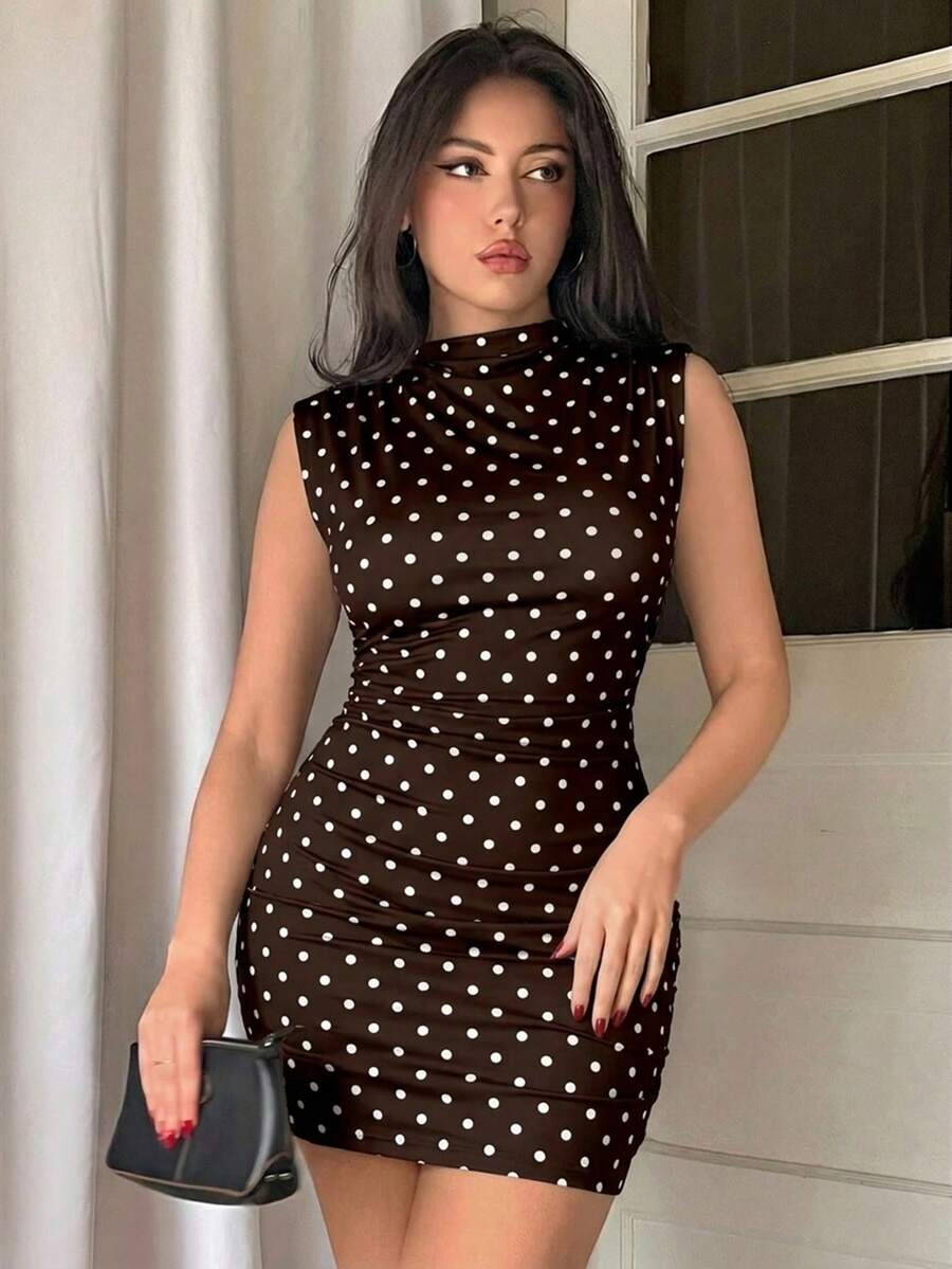 Army green sleeveless bodycon mini dress with a stand collar, ruched details, and zipper back.