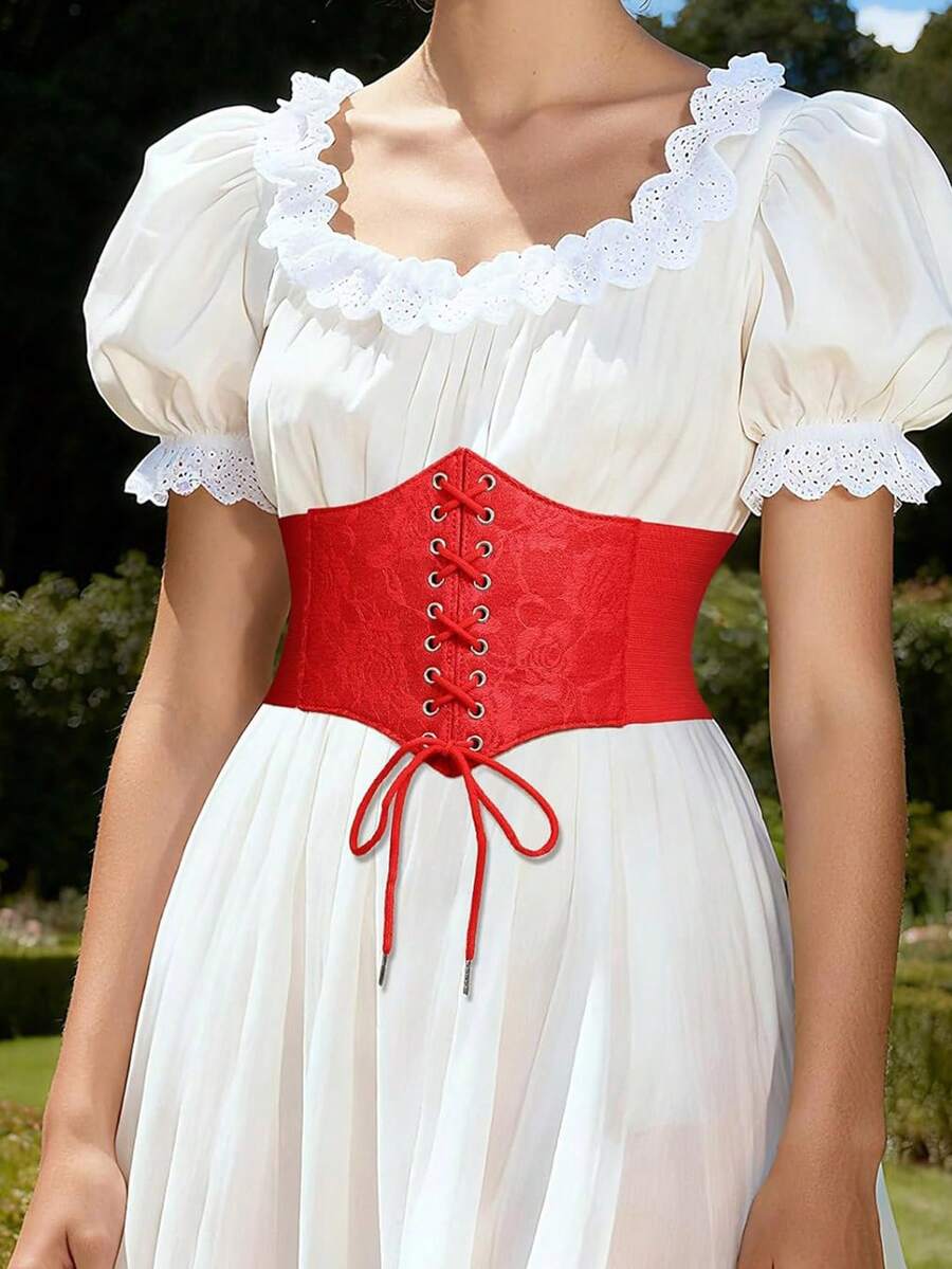 Black lace-up waist cincher with grommet eyelets, baroque pattern, medium stretch, and wide belt design for women.