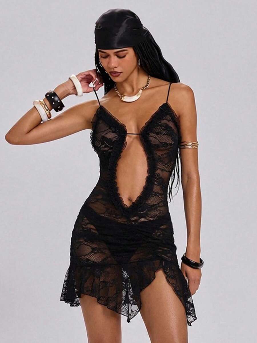 Women's black lace patchwork mini cami dress with spaghetti straps, contrast mesh, and side slit.