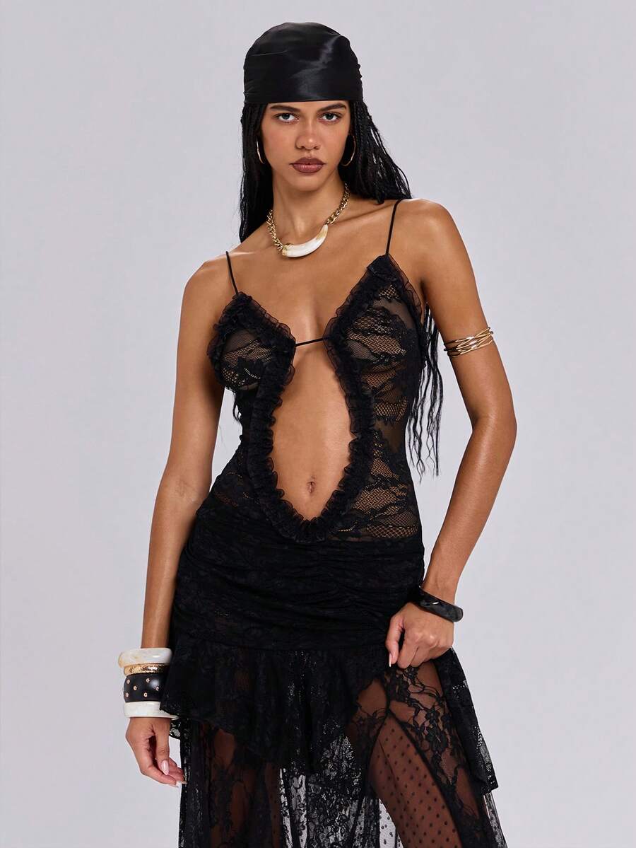 Women's black lace patchwork mini cami dress with spaghetti straps, contrast mesh, and side slit.