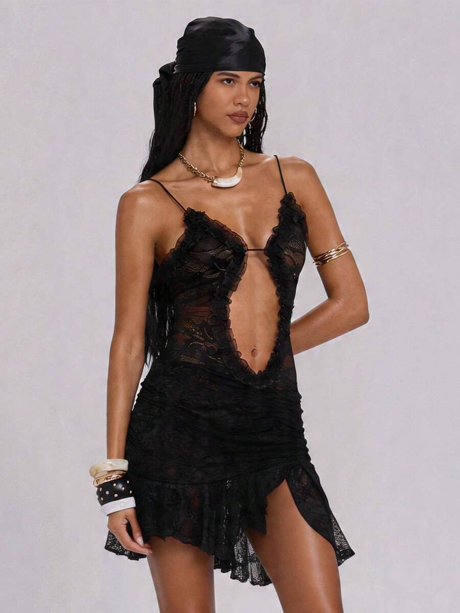 Women's black lace patchwork mini cami dress with spaghetti straps, contrast mesh, and side slit.