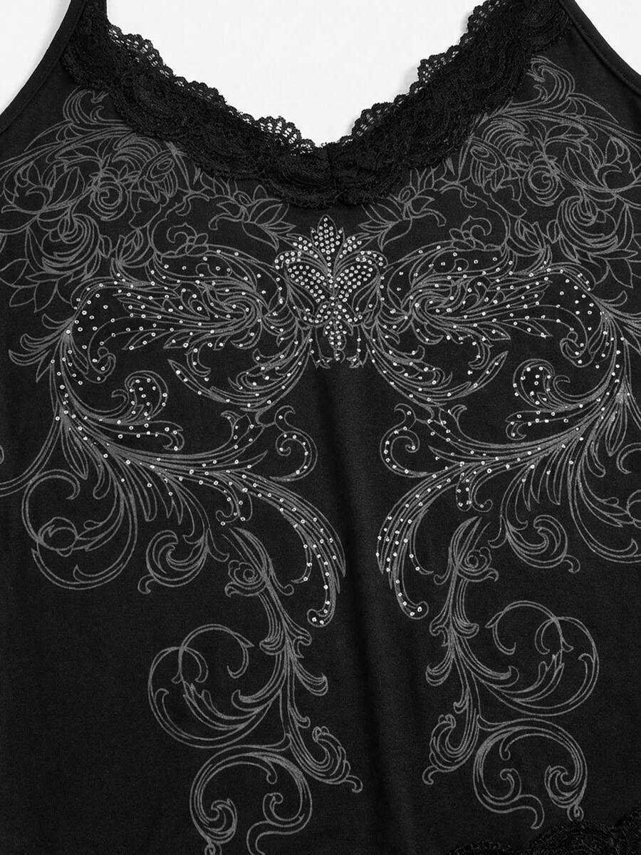 Pink floral print crop camisole top for women featuring contrast lace trim, spaghetti straps, and a slim fit.