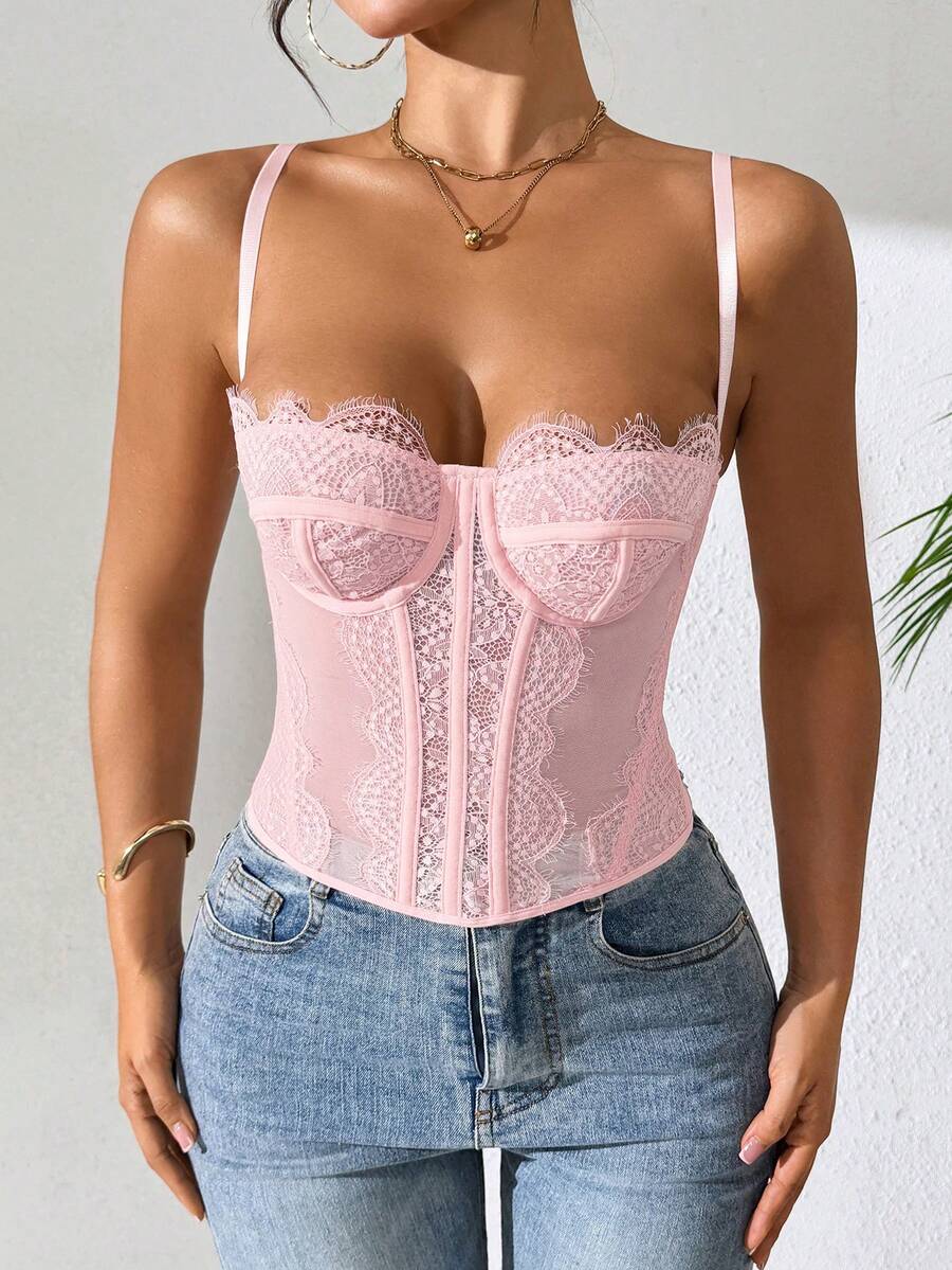 Women's brown lace trim cami corset crop top featuring a low cut neck, unlined body, and slim fit bodycon silhouette.