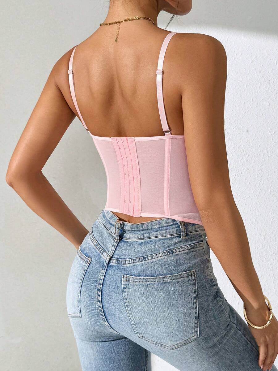 Women's brown lace trim cami corset crop top featuring a low cut neck, unlined body, and slim fit bodycon silhouette.