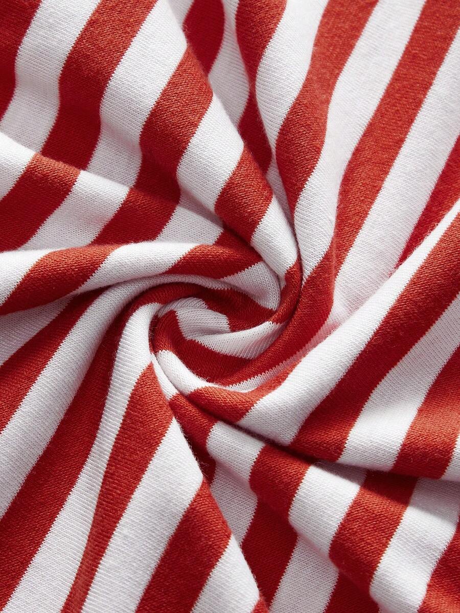 Red and white striped camisole top featuring contrast white scallop lace trim along the neckline and slim fit spaghetti straps.