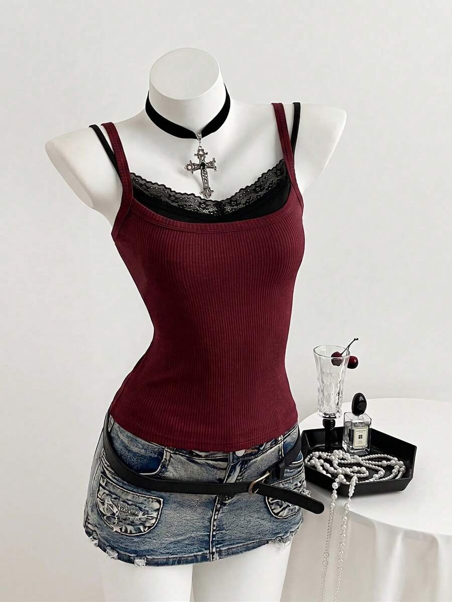 Women's slim fit spaghetti strap cami tank top with contrast lace trim along the neckline