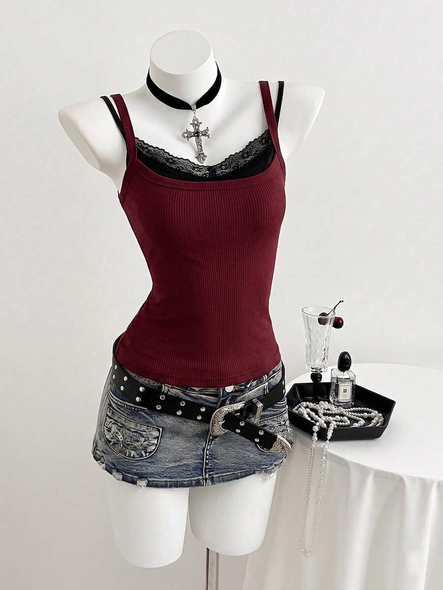 Women's slim fit spaghetti strap cami tank top with contrast lace trim along the neckline
