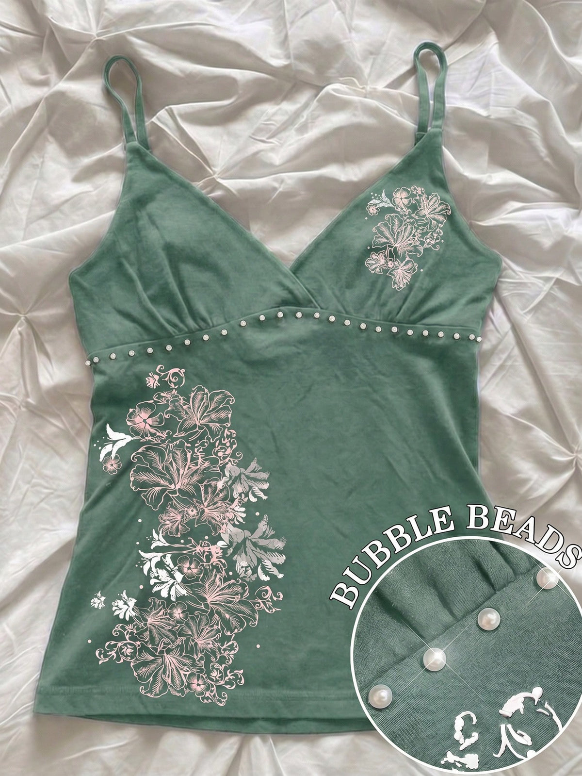 Women's slim fit spaghetti strap cami top featuring a tropical hibiscus floral graphic print.