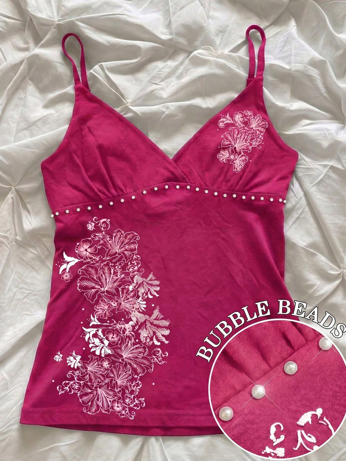Women's slim fit spaghetti strap cami top featuring a tropical hibiscus floral graphic print.