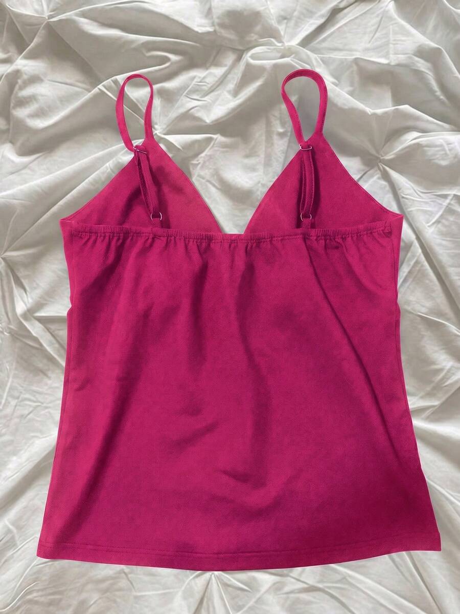 Women's slim fit spaghetti strap cami top featuring a tropical hibiscus floral graphic print.