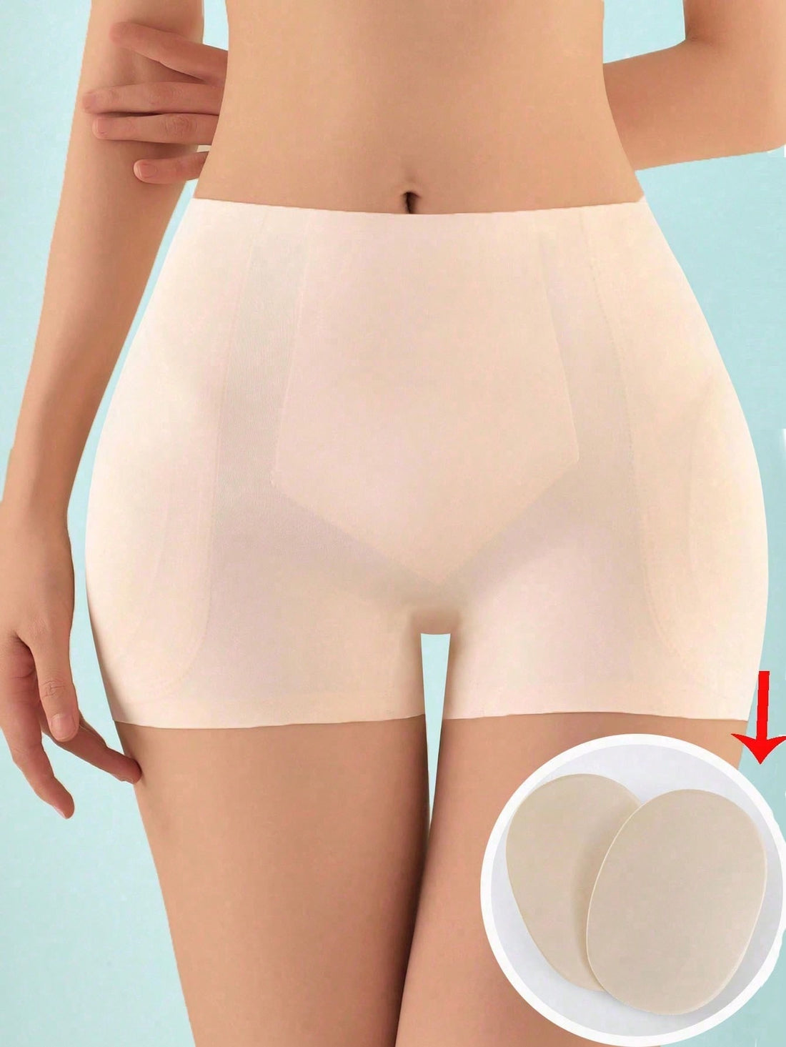 Women's high waist seamless tummy control panties with hip enhancer padding in apricot.